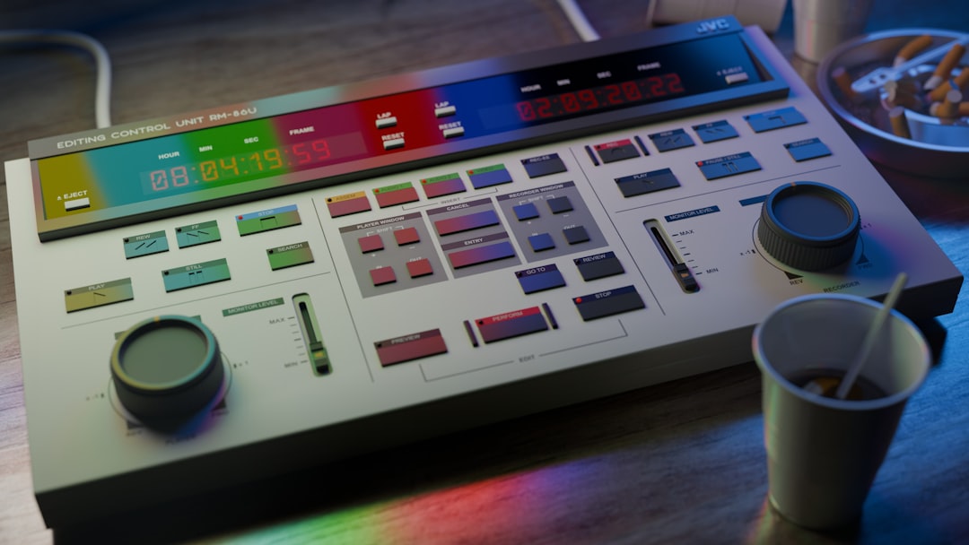 Vintage video editing console with colorful buttons and knobs