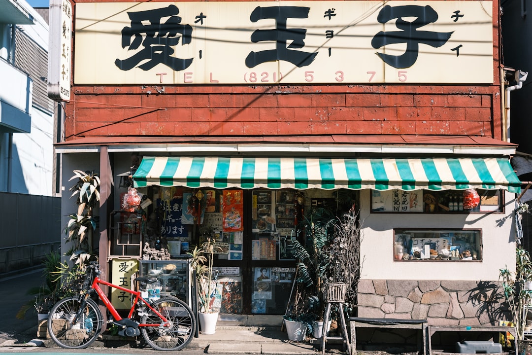 a bike parked outside of a store front